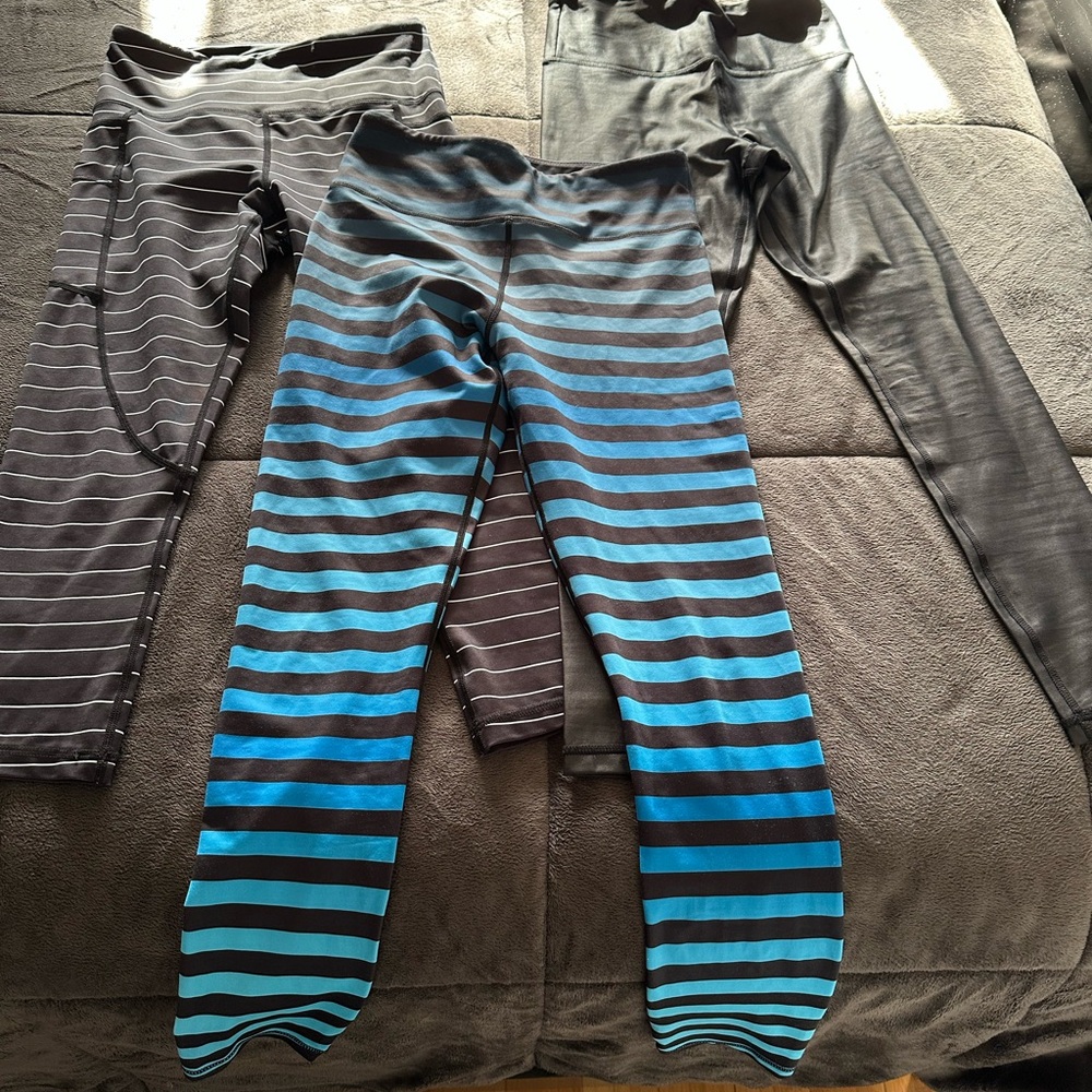 ZYIA  Leggings in Blue, Black Stripes and shiny black.